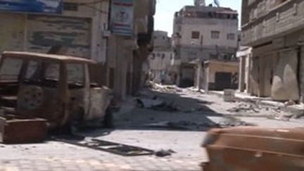 Dans les ruines du quartier Beyada à Homs (AFP)