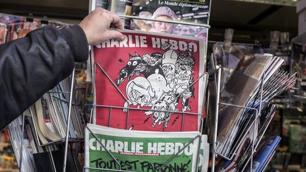 "Charlie Hebdo" en vente dans un kiosque lyonnais en février 2015.
 (Jeff Pachoud / AFP)