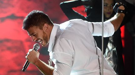 Saad Lamjarred sur scène à Carthage (Tunisie) le 31 juillet 2016 (FETHI BELAID / AFP)