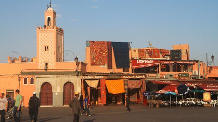 A mosque and souvenir shops on the edge of Jema el Fnaa square, in Marrakech (illustrative photo, March 22, 2023).  (HTTP://IMAGEBROKER.COM/#/SEARCH/6851546)