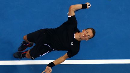 Le tennisman tch&egrave;que Tomas Berdych lors d'un match contre Ga&euml;l Monfils, &agrave; Dubai (Emirats arabes unis), le 11 d&eacute;cembre 2014.&nbsp; (MARWAN NAAMANI / AFP)