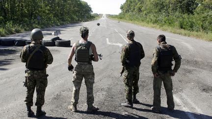 Des soldats ukrainiens, le 5 septembre 2014 &agrave; Debaltseve (Ukraine). (ANATOLII STEPANOV / AFP)