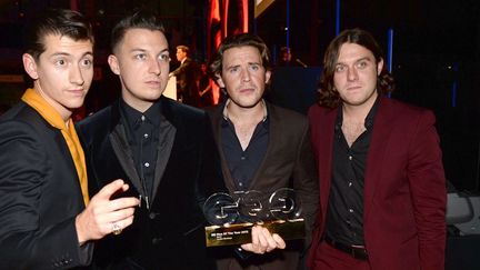 Le groupe Arctic Monkeys, récompensé aux "GQ Men of the Year Awards", le 3 septembre 2013 à Londres
