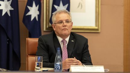 Le Premier ministre australien Scott Morrison lors d'une vidéoconférence avec les leaders du G20 à propos du coronavirus, le 26 mars 2020 à Canberra. (GARY RAMAGE / POOL / AFP)