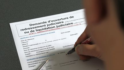 Formulaire de redressement judiciaire ou de liquidation judiciaire. (MAXPPP)