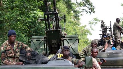 Des membres des forces d'Alassane Ouattara à Duékoué (ouest de la Côte d'Ivoire), le 29 mars 2011 (AFP / Zoom Dosso)