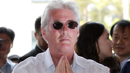 L'acteur am&eacute;ricain Richard Gere dans un temple bouddhiste, &agrave; S&eacute;oul (Cor&eacute;e du Sud), le 21 juin 2011. (LEE JIN-MAN / AFP)