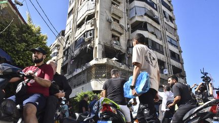 A building damaged by an Israeli strike in a neighborhood in the southern suburbs of Beirut (Lebanon), October 3, 2024. (FADEL ITANI / NURPHOTO VIA AFP)