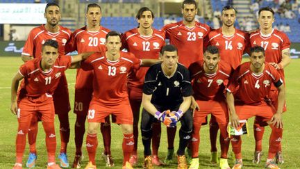 La sélection palestinienne avant sa rencontre avec l'Arabie Saoudite dans le cadre des qualifications du Mondial 2018, à Dammam, en Arabie Saoudite le 11 juin 2015. 

 (AFP PHOTO / STR)