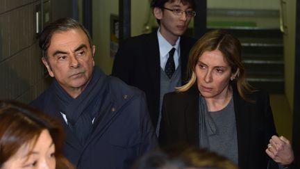 Carlos Ghosn et sa femme Carole Ghosn, au Japon, le 14 avril 2019. (KAZUHIRO NOGI / AFP)