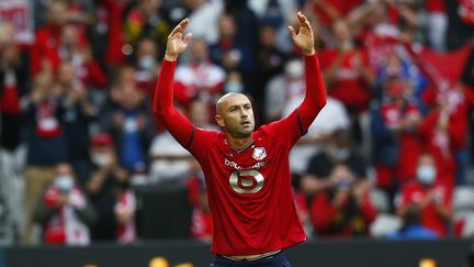 Burak Yilmaz, habitués aux derbies en Turquie, sera l'un des hommes clés du LOSC face au RC Lens. (MICHEL SPINGLER / AP)