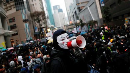 Des manifestants antigouvernement à Hong Kong, le 1er janvier 2020. (TYRONE SIU / REUTERS)