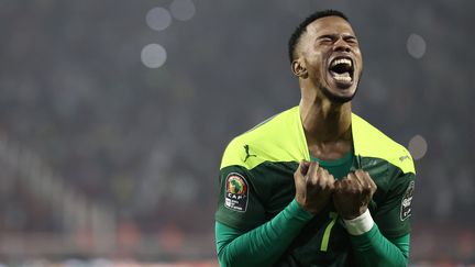 Le Sénégalais Keita Balde célèbre la victoire des Lions de la Teranga en Coupe d'Afrique des nations, dimanche 6 février.&nbsp; (KENZO TRIBOUILLARD / AFP)