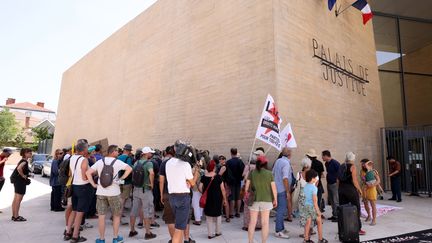 A rally takes place in front of the Aix-en-Provence courthouse on July 11, 2023, during a summons in the investigation into an action by environmental activists against a Lafarge cement factory.  (SOLLIER CYRIL / MAXPPP)