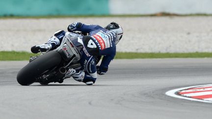 Randy de Puniet (Power Electronics Aspar) roule sur une CRT (ROSLAN RAHMAN / AFP)