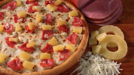 De la pizza aux ananas. (KYLE ROTHENBORG / GETTY IMAGES)