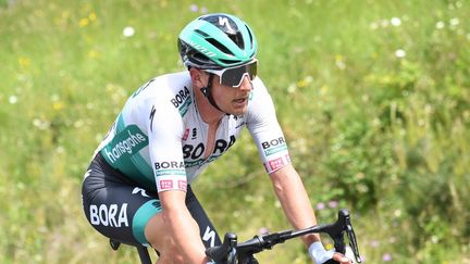 Lukas Pöstlberger (Bora-Hansgrohe) sur les routes du Critérium du Duaphiné, le 31 mai 2021. (ALAIN JOCARD / AFP)