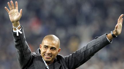 David Trezeguet salue le public turinois, début janvier 2014 (MARCO BERTORELLO / AFP)