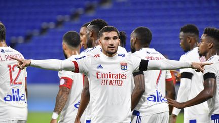 Houssem Aouar célèbre son but sur pénalty contre Monaco. (PHILIPPE DESMAZES / AFP)