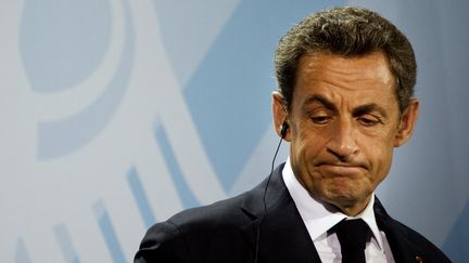 Nicolas Sarkozy &agrave; Berlin (Allemagne), &agrave; l'issue d'un sommet de la zone euro, le 9 octobre 2011. (ODD ANDERSEN/AFP)