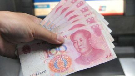 De la révolution à l'argent... Mao illustre les billets de banque chinois. (AFP/HU JIANHUANG NJ / IMAGINECHINA)