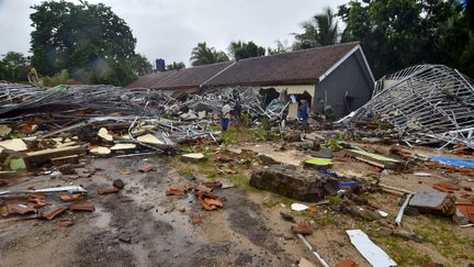 Des maisons ravagées par le tsunami, à Carita (Indonésie), le 23 décembre 2018. (RONALD / AFP)