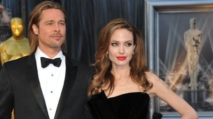 Actress Angelina Jolie and actor Brad Pitt arrive on the red carpet for the 84th Annual Academy Awards on February 26, 2012 in Hollywood, California
 (JOE KLAMAR / AFP)