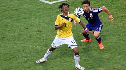 Cuadrado (Colombie) devant Nagatomo (Japon) (JUAN BARRETO / AFP)