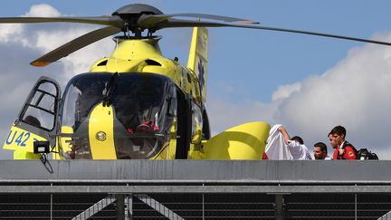 Transfert de Christopher Froome au centre hospitalier de Roanne, le 12 juin. (ANNE-CHRISTINE POUJOULAT / AFP)