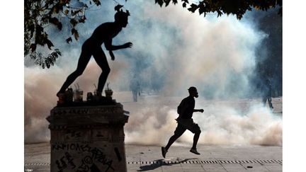 Louisa Gouliamaki, Angelos Tzortzinis et Aris Messinis ont suivi au jour le jour, pour l&#039;AFP, l&#039;actualité politique et sociale de la Grèce, entre plans d&#039;urgence et manifestations
 (Aris Messinis / AFP)