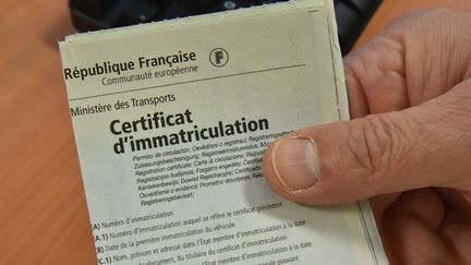 A registration certificate or gray card.  (MAXPPP)