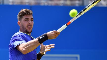 Le jeune Australien Kokkinakis (GLYN KIRK / AFP)