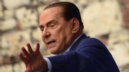 L'ancien pr&eacute;sident du Conseil Silvio Berlusconi, le 11 mai 2013 &agrave; Brescia (Italie). (OLIVIER MORIN / AFP)