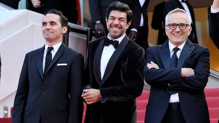 Pierfrancesco Favino (au centre) et le réalisateur italien Marco Bellocchio (à droite) présentent Le Traître. Le film est lice pour la Palme d'or de ce 72e festival de Cannes. (ANTHONY HARVEY/REX/SIPA / SHUTTERSTOCK)