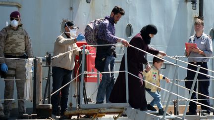 Des migrants débarquent en Italie