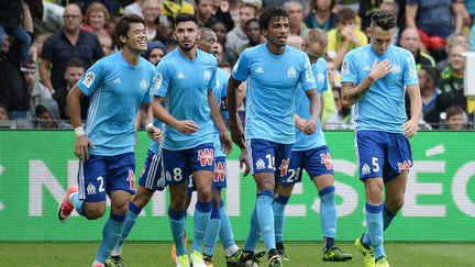 Les joueurs de l'Olympique de Marseille. (JEAN-SEBASTIEN EVRARD / AFP)