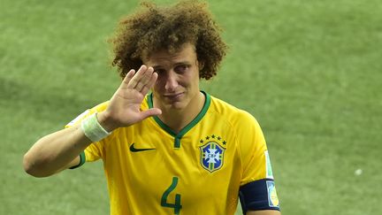 Le d&eacute;fenseur br&eacute;silien David Luiz apr&egrave;s la d&eacute;faite de son &eacute;quipe face &agrave; l'Allemagne, le 8 juillet 2014, &agrave; Belo Horizonte (Br&eacute;sil). (GABRIEL BOUYS / AFP)