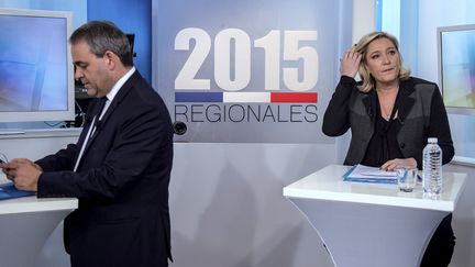 Xavier Bertrand et Marine Le Pen, candidats aux régionales en Nord-Pas-de-Calais-Picardie, lors d'un débat à Lille (Nord), le 3 décembre 2015. (PHILIPPE HUGUEN / AFP)