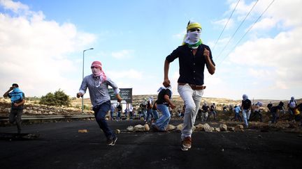 &nbsp; (Des manifestants palestiniens à Ramallah, samedi 10 octobre © MaxPPP)