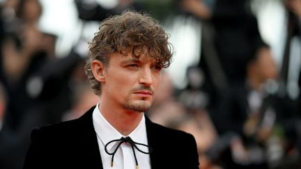 L'acteur franco-canadien, Niels Schneider, en mai 2022, à Cannes. (PATRICIA DE MELO MOREIRA / AFP)