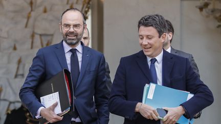 Le Premier ministre Edouard Philippe et le porte-parole du gouvernement Benjamin Griveaux à l'Elysée, à Paris, le 9 janvier 2019. (FRANCOIS GUILLOT / AFP)