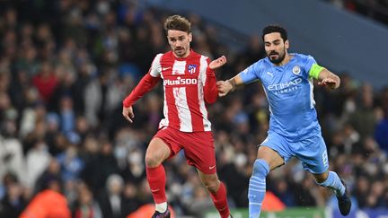 Opposition de style à prévoir entre Antoine Griezmann (Atlético de Madrid) et Ilkay Gündogan (Manchester City), mercredi soir. (PAUL ELLIS / AFP)