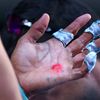 La main gauche du tennisman Rafael Nadal, lors de son quart de finale de l'Open d'Australie contre Grigor Dimitrov, le 22 janvier 2014 &agrave; Melbourne.&nbsp; (QUINN ROONEY / GETTY IMAGES)