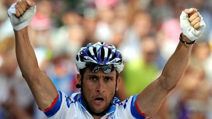 Sandy Casar lors de sa victoire sur le Tour 2010 (la 9e étape Morzine - St-Jean-de Maurienne) (PASCAL PAVANI / AFP)