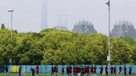 Les joueurs du SIPG de Shanghai participent au premier entraînement public après l'apparition du coronavirus, 7 mai 2020. 
 (ALY SONG / X01793)