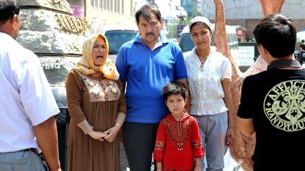 Des Ouïghours à Urumqi, dans la province chinoise du Xinjiang. (STR / AFP)