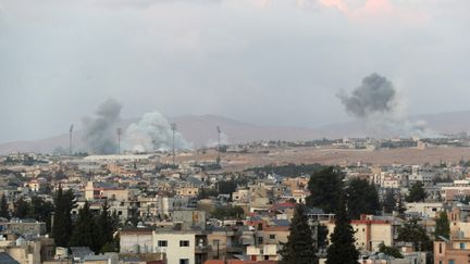 Smoke rises from several sites struck by the Israeli army near Baalbeck, eastern Lebanon, on September 23, 2024. (AFP)