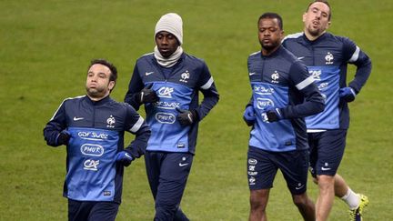 Les joueurs français Mathieu Valbuena, Blaise Matuidi, Patrice Evra et Franck Ribéry