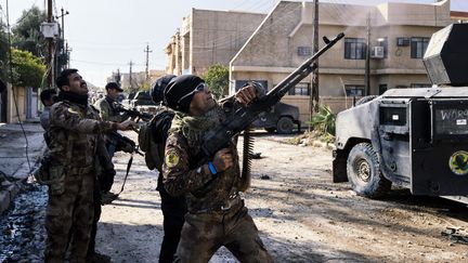 Des membres des forces spéciales irakiennes de contre-terrorisme à Mossoul (Irak), le 8 janvier 2017. (DIMITAR DILKOFF / AFP)