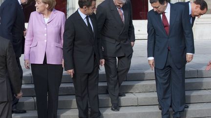 Etre solidaire. On est mignon et on aide ses petits camarades &agrave; trouver son emplacement. (PHILIPPE WOJAZER / REUTERS)